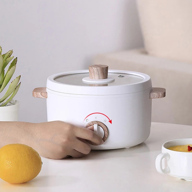 Multi-Function Mini Electric Cooker – 1.2L Portable Cooking Pot for Boiling, Steaming, and Rice Cooking – Ideal for Dorms, Offices, and Small Households